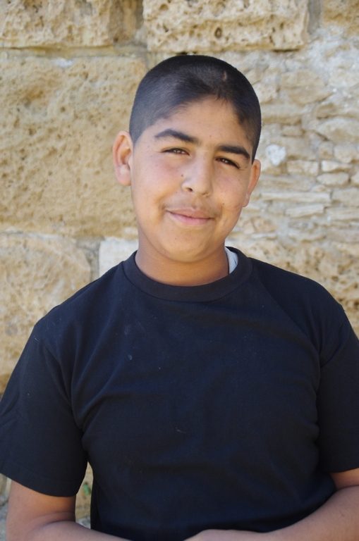Jeune syrien, devenu cireur de chaussures pour subsister